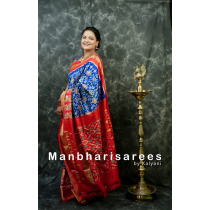 Vibrant Blue & Red Ikkat Silk Saree with Geometric Zari Border